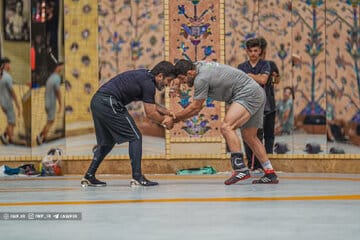 عکس| قهرمان المپیک در جمع قهرمانان دنیا: شما بهترین هستید