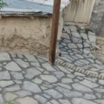 آغاز تحول زیرساختی در روستای تاریخی جوین با اجرای سنگفرش معابر